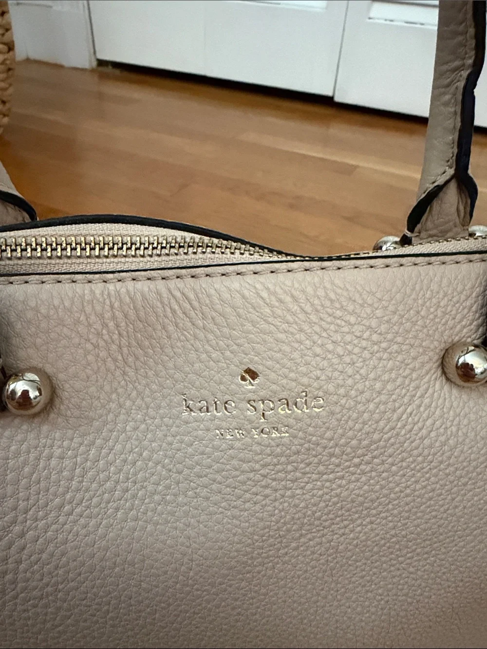Kate Spade Beige Pebbled Leather Satchel with Crossbody Strap and Gold Hardware